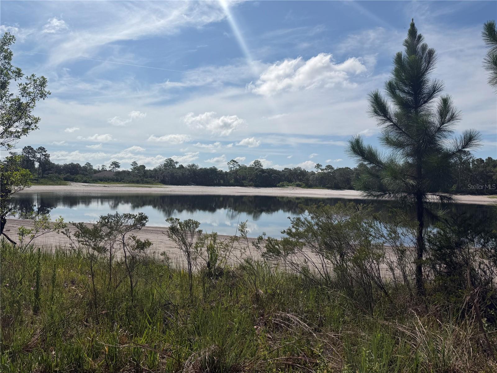 2nd image of Tbd Malauka Pass Trl, Ocklawaha, FL 32179 | MLS# OM729258
