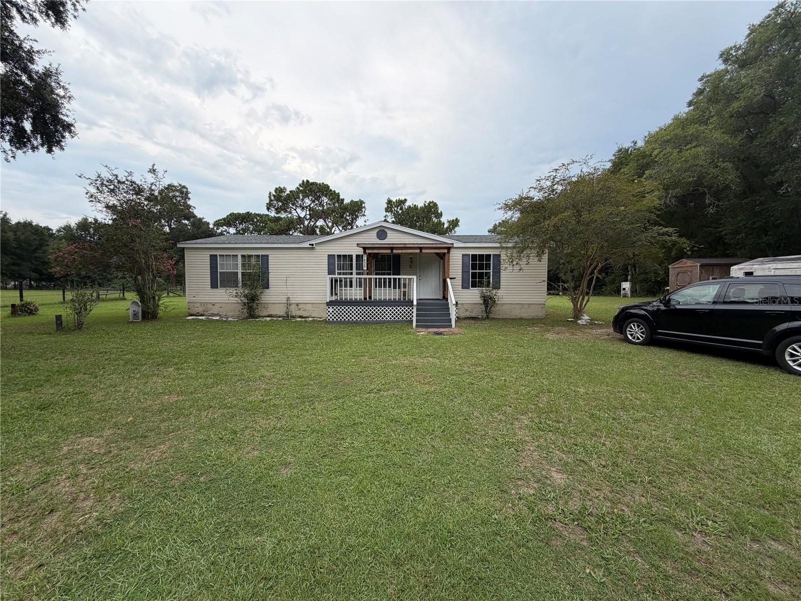 1st image of 7830 Sw 19th Pl, Ocala, FL 34474 | MLS# O6429042