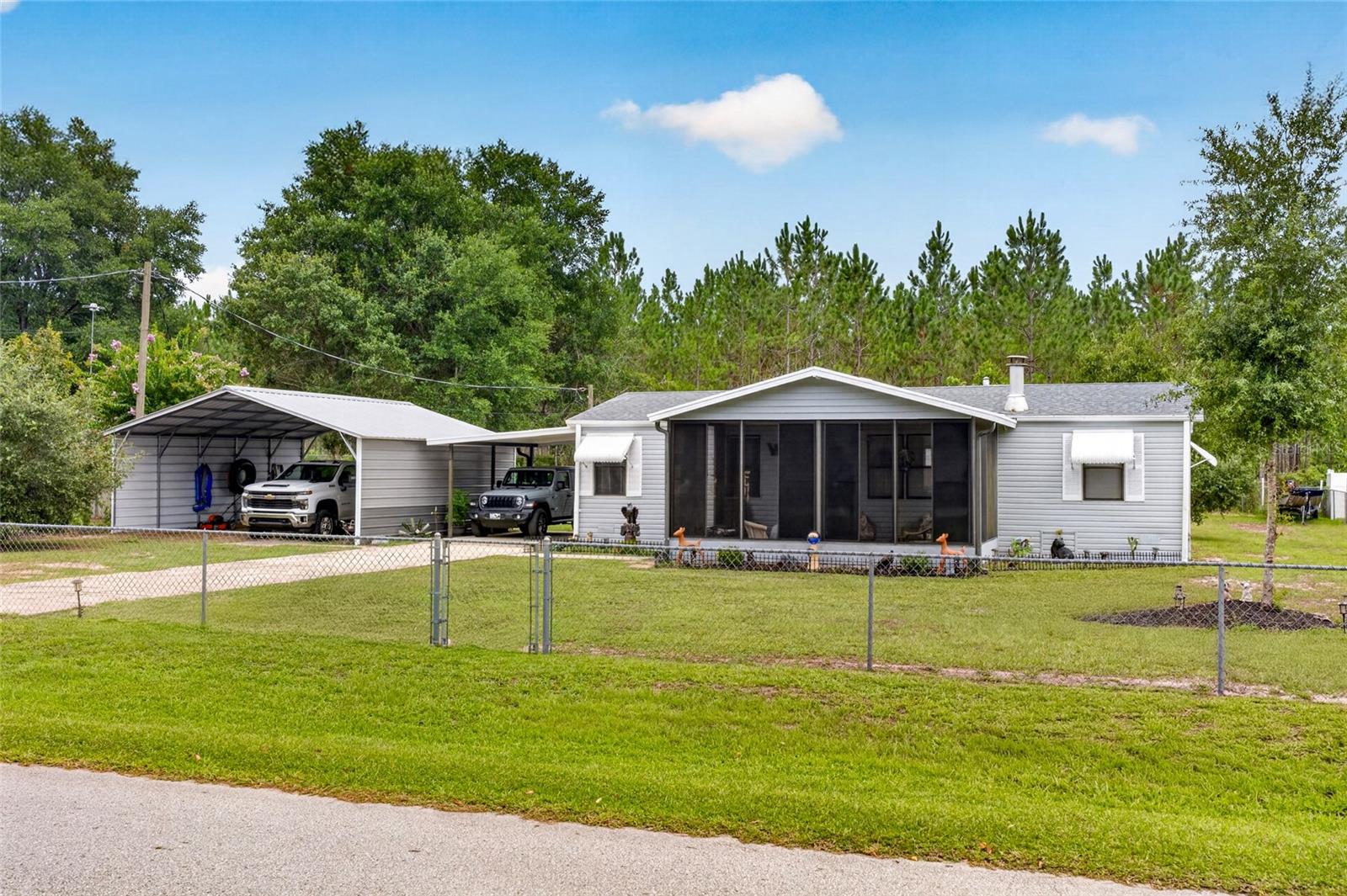 1st image of 18544 Se 55th Pl, Ocklawaha, FL 32179 | MLS# OM729393