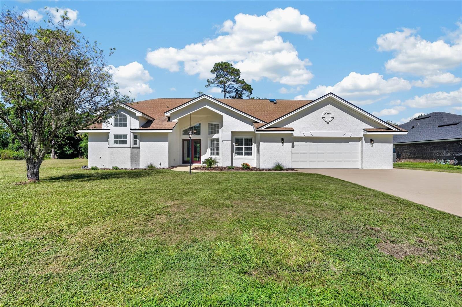 2nd image of 107 Lindsay Dr, Palm Coast, FL 32137 | MLS# FC320287