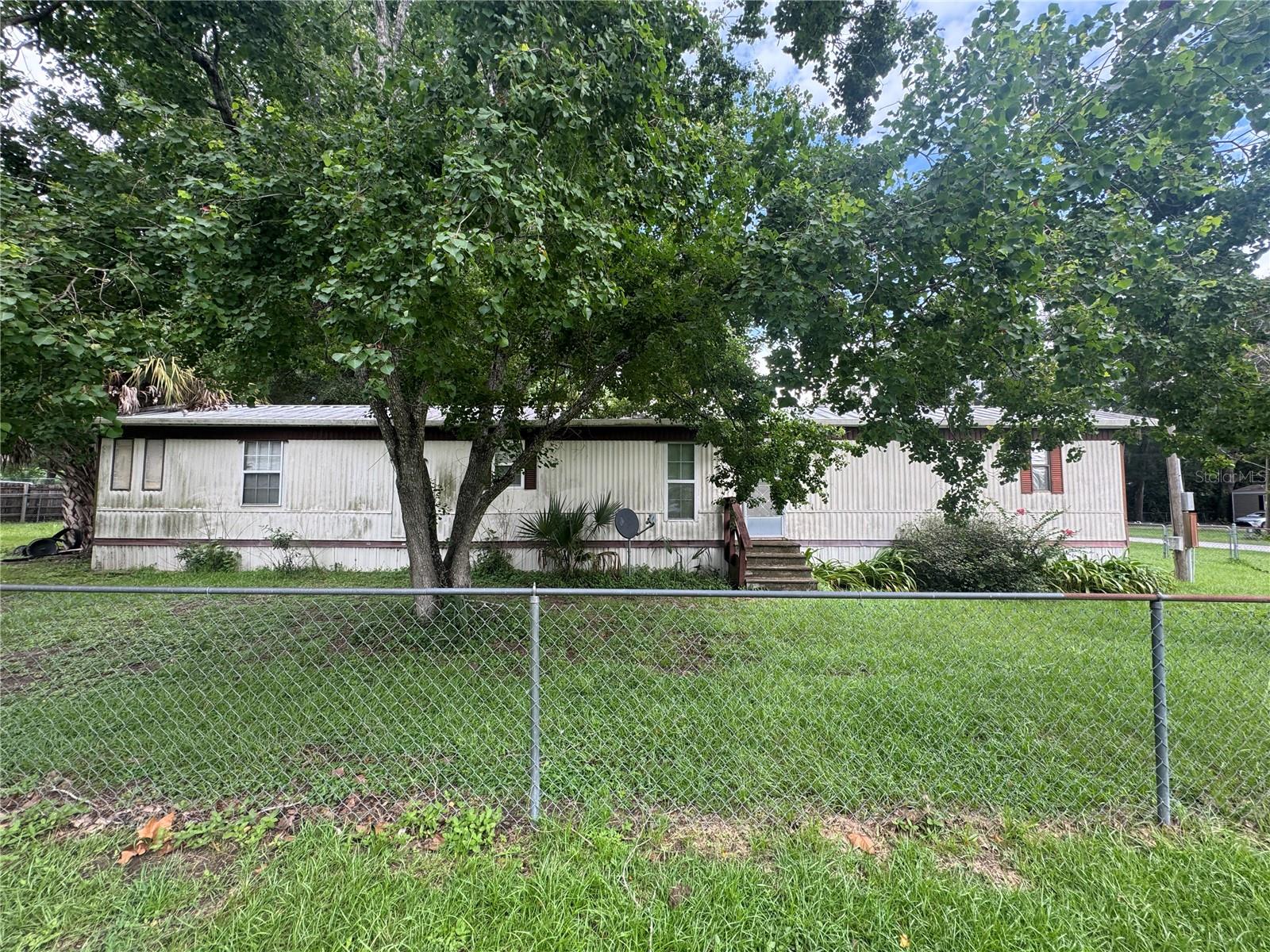 4th image of 3285 Se 131St Pl, Belleview, FL 34420 | MLS# OM729449