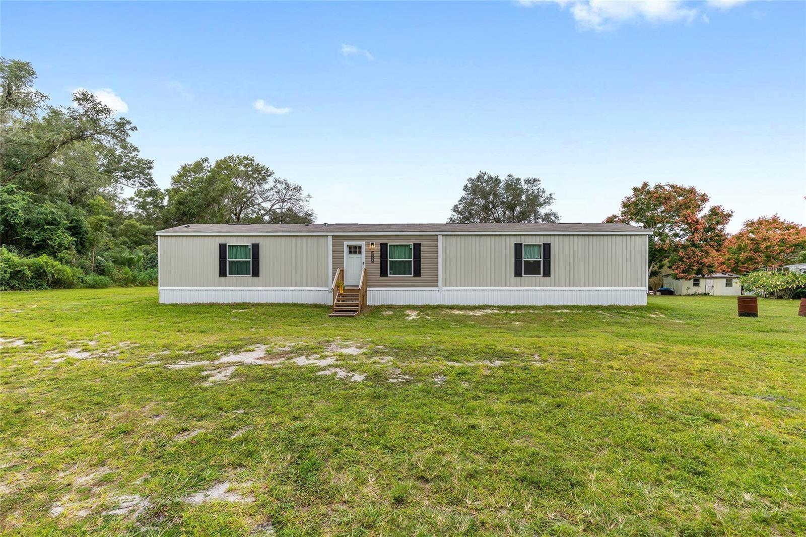 4th image of 14642 Ne 111Th Ter, Fort Mc Coy, FL 32134 | MLS# OM729453
