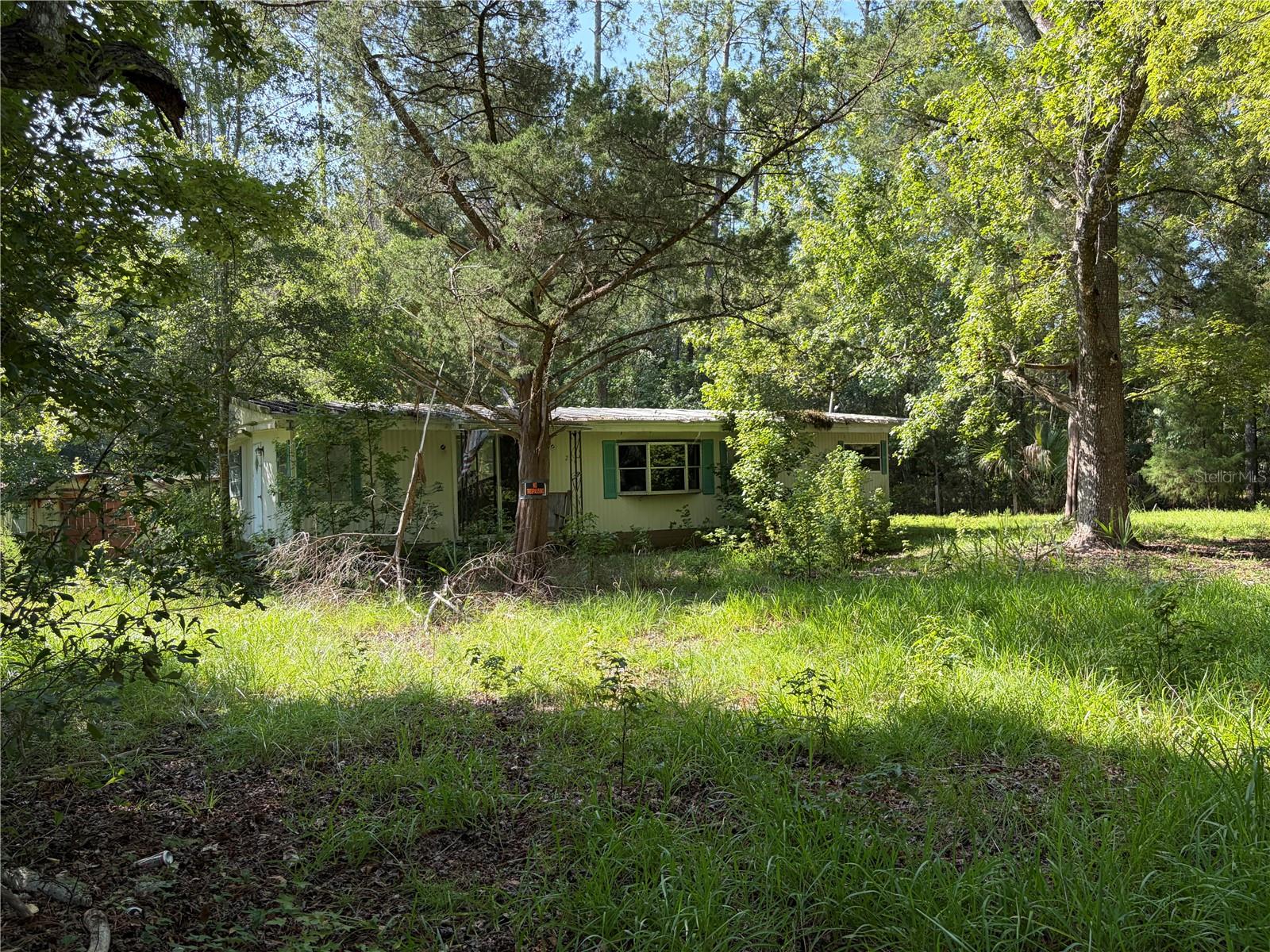 1st image of 2361 Ne 115th Ave, Silver Springs, FL 34488 | MLS# OM729595