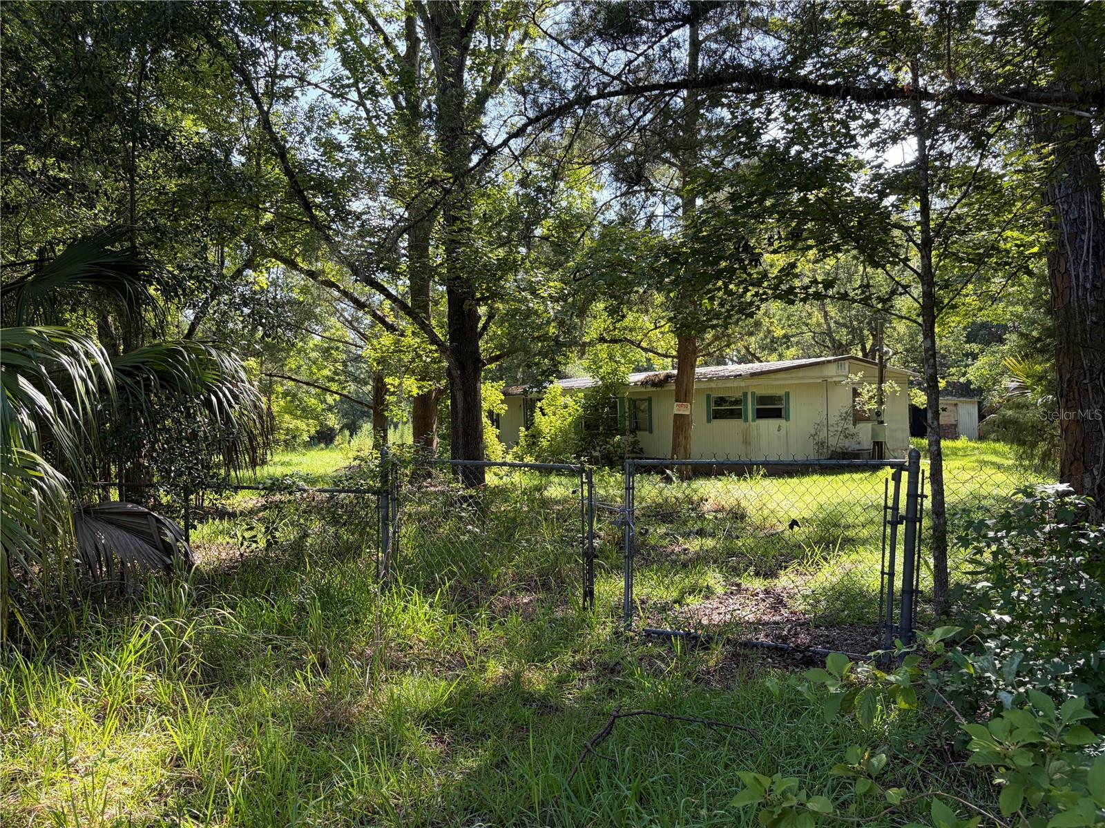 3rd image of 2361 Ne 115Th Ave, Silver Springs, FL 34488 | MLS# OM729595