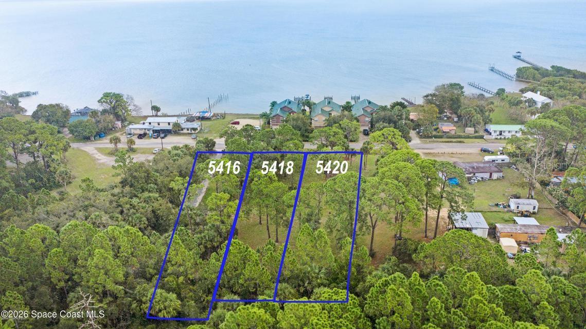 1st image of 5416 5420 Riveredge Dr, Titusville, FL 32780 | MLS# O6430208