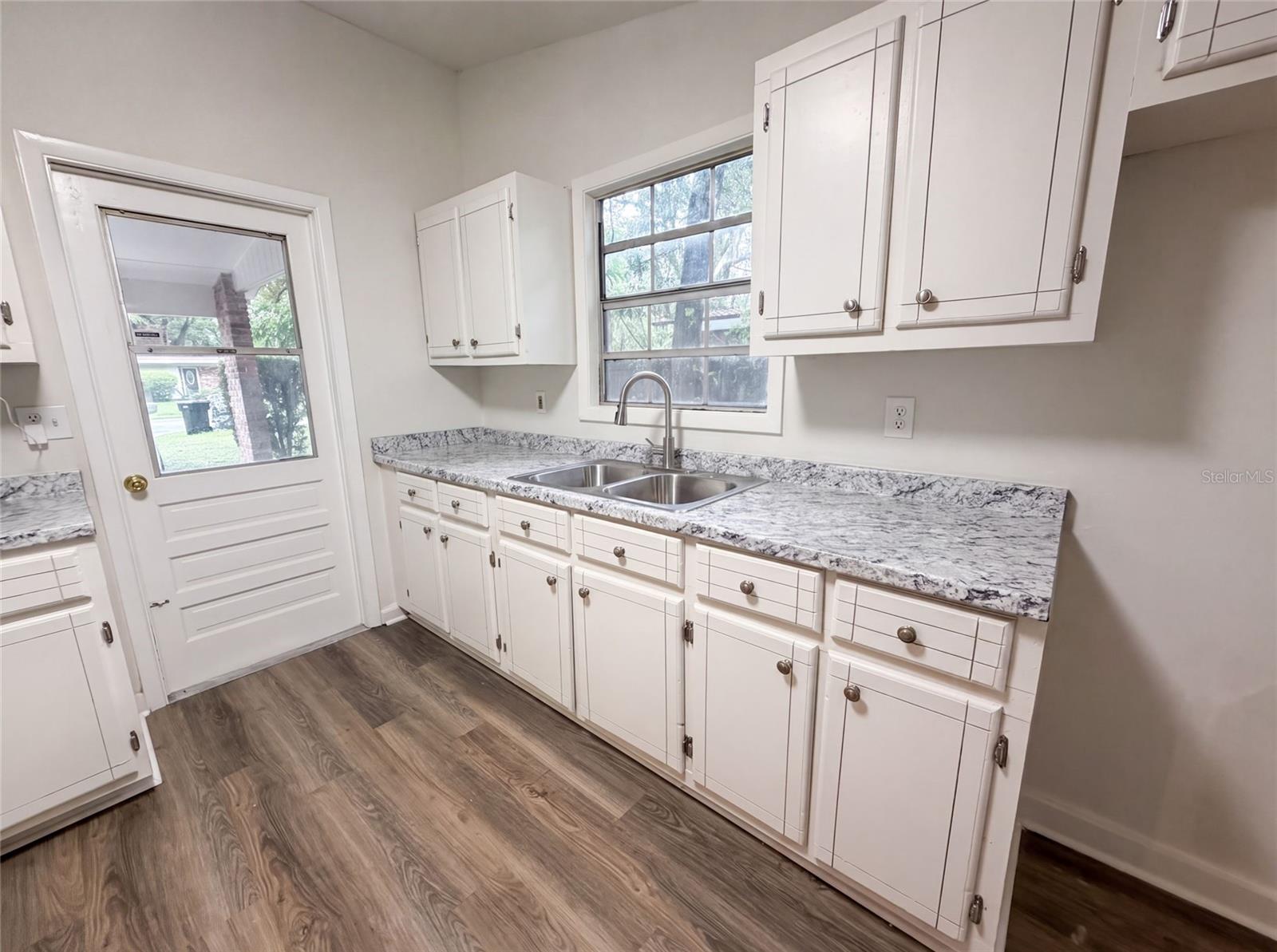 4th image of 1034 Ne 31St Ave, Gainesville, FL 32609 | MLS# O6430344