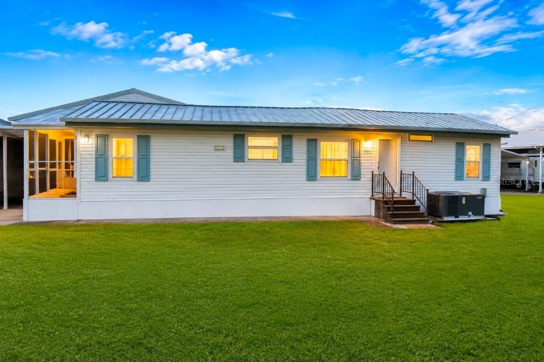 1st image of 5951 Se 158th Ct, Ocklawaha, FL 32179 | MLS# OM730019