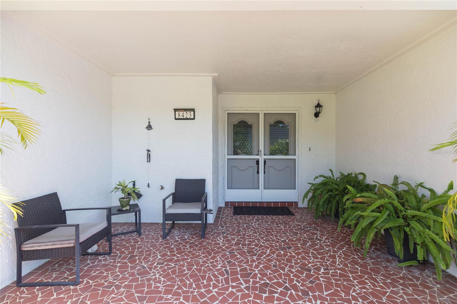 4th image of 8423 Pebble Dr, Port Richey, FL 34668 | MLS# TB8538309