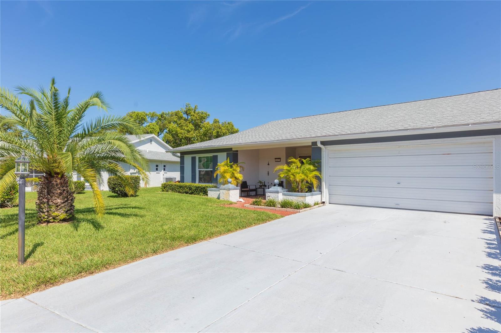 3rd image of 8423 Pebble Dr, Port Richey, FL 34668 | MLS# TB8538309
