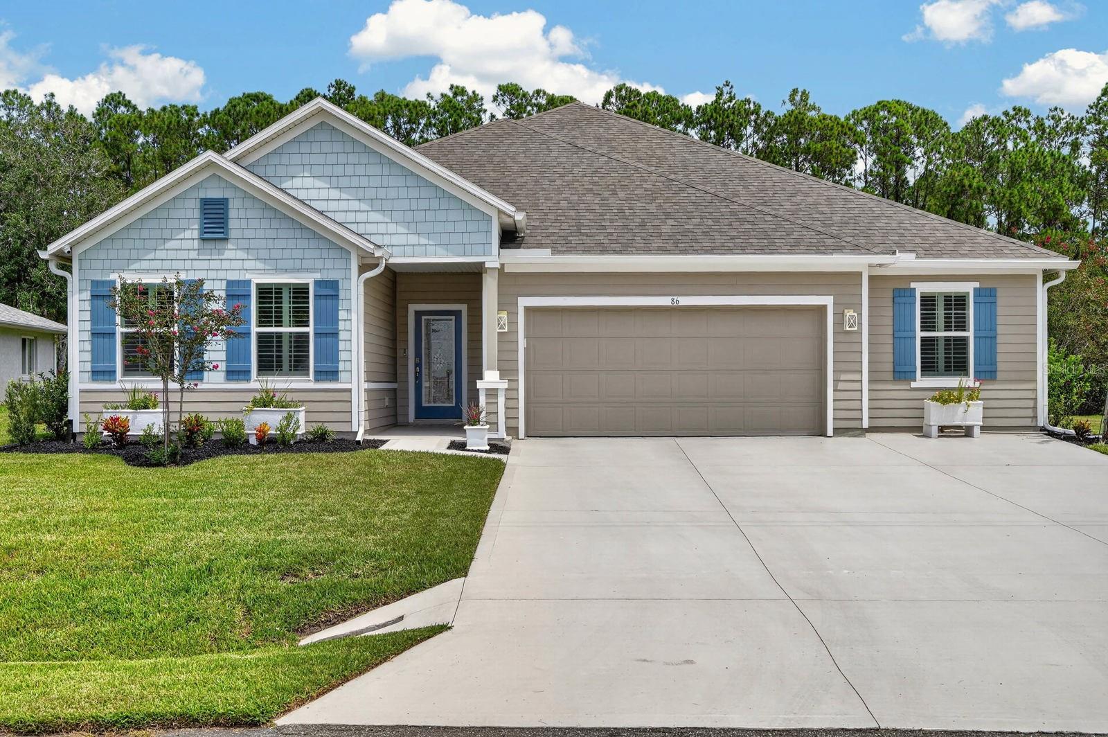 1st image of 86 Whispering Pine Dr, Palm Coast, FL 32164 | MLS# FC320898