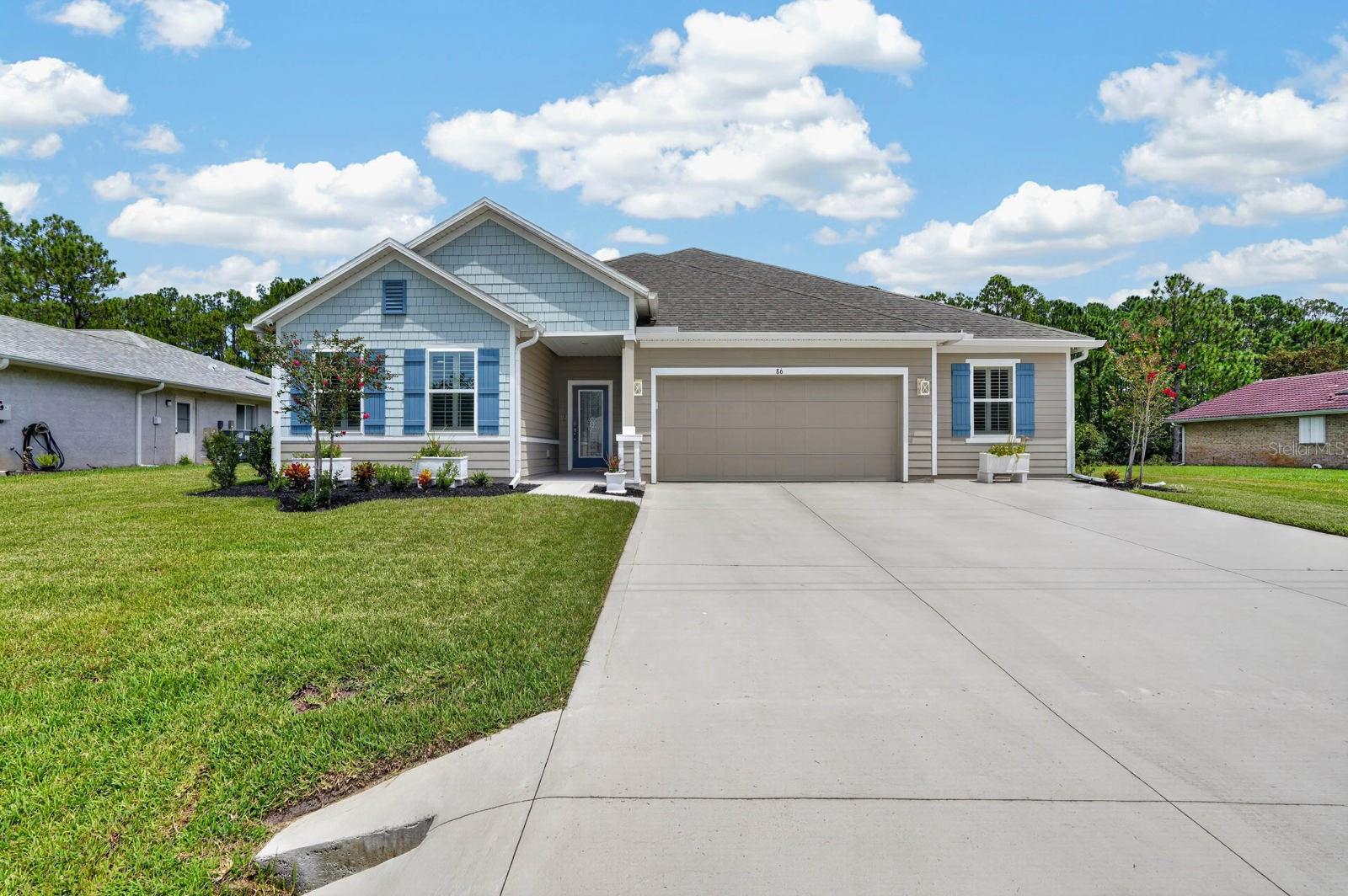 3rd image of 86 Whispering Pine Dr, Palm Coast, FL 32164 | MLS# FC320898