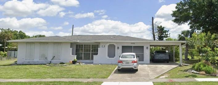 1st image of 2306 Beacon Dr, Port Charlotte, FL 33952 | MLS# O6436134