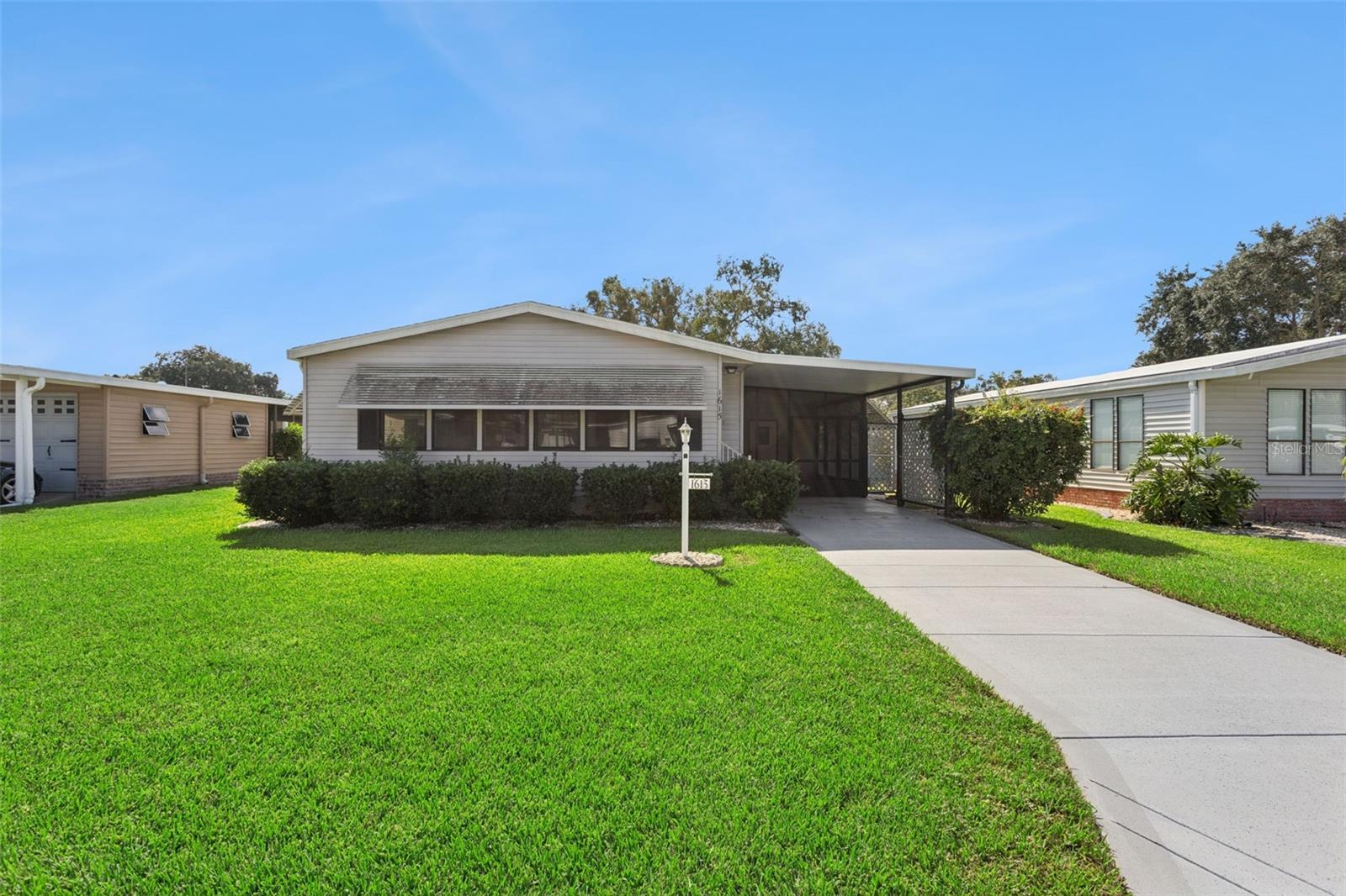 1st image of 1615 Pinehurst Dr, Lady Lake, FL 32159 | MLS# O6436168