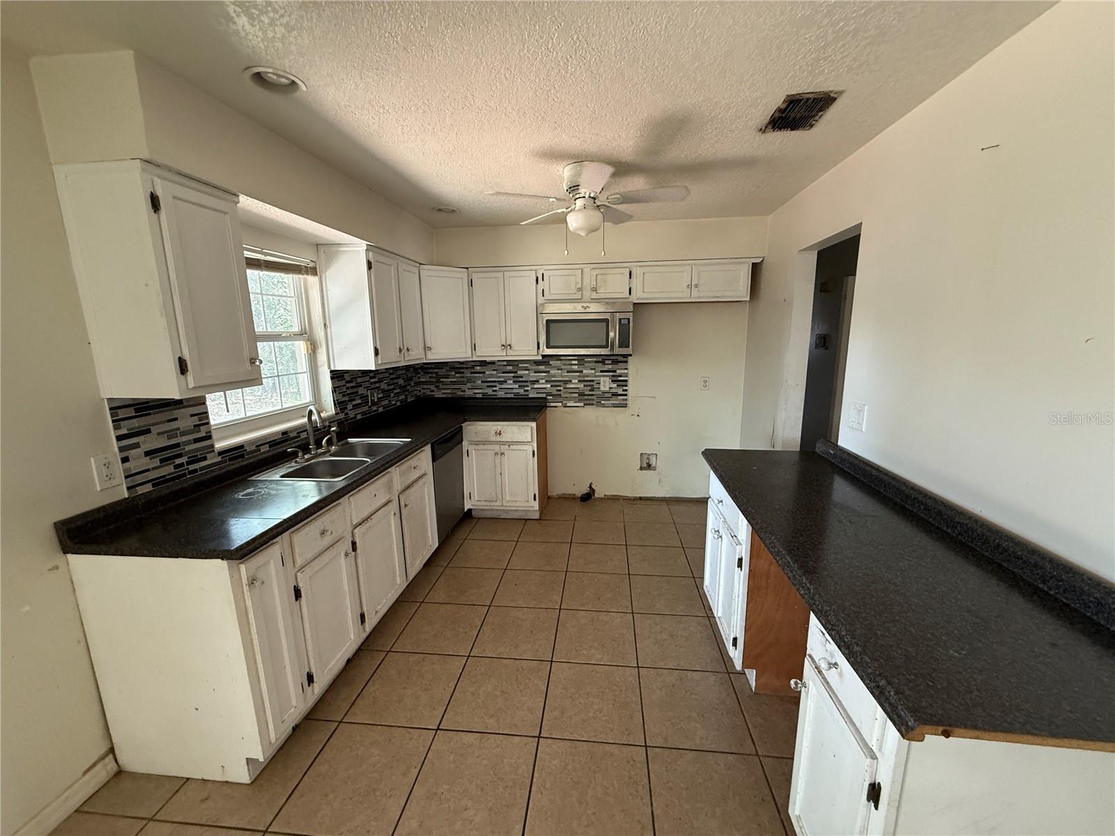 4th image of 3608 Tam Dr, Orlando, FL 32808 | MLS# O6436606
