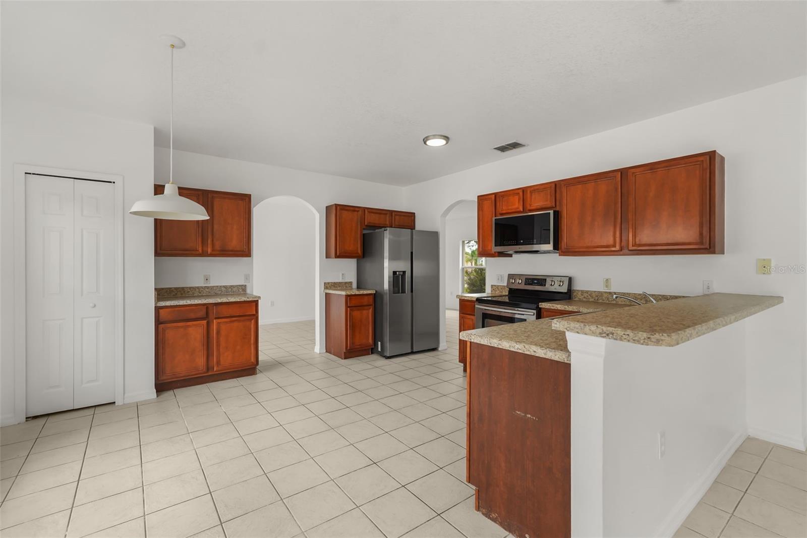 Photo 4 of Single family home for sale at 1348 Nelson Park Ct, Kissimmee, FL 34759 | MLS# O6436683 | Listing updated on 2026-09-02