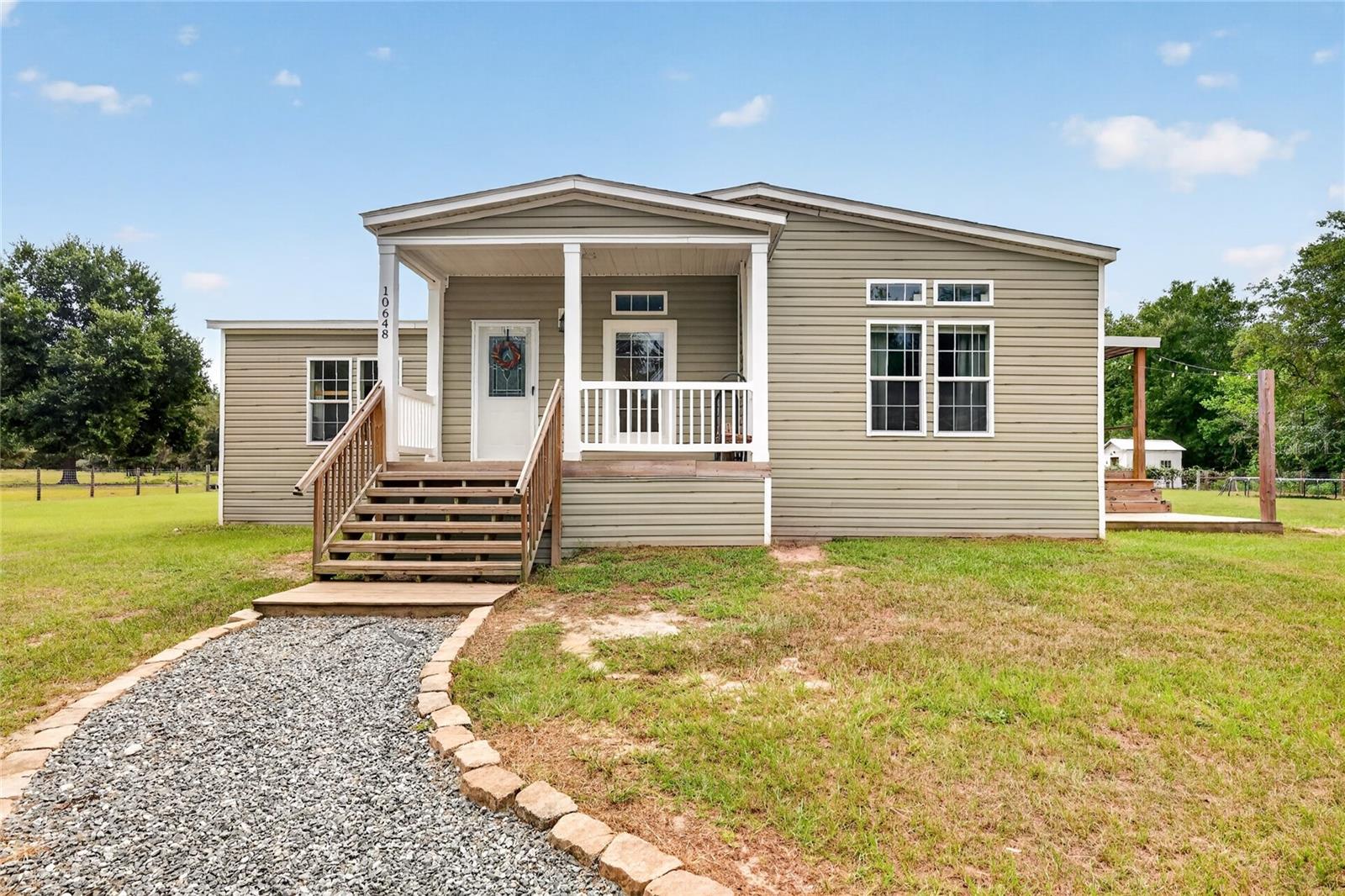 4th image of 10648 Se Hwy 464C, Ocklawaha, FL 32179 | MLS# OM731155