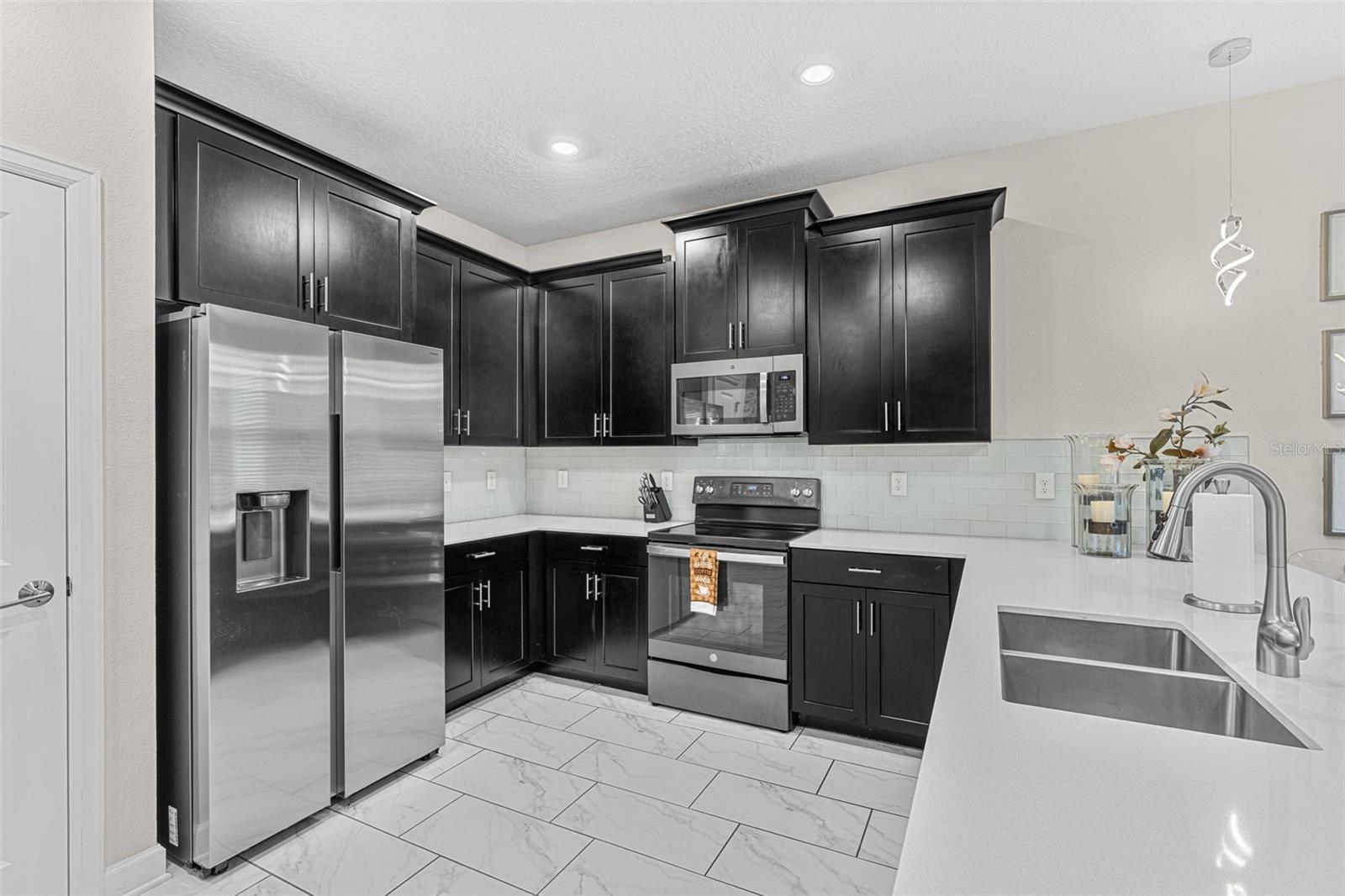 4th image of 9032 Sommerset Hills Dr, Davenport, FL 33896 | MLS# O6436920