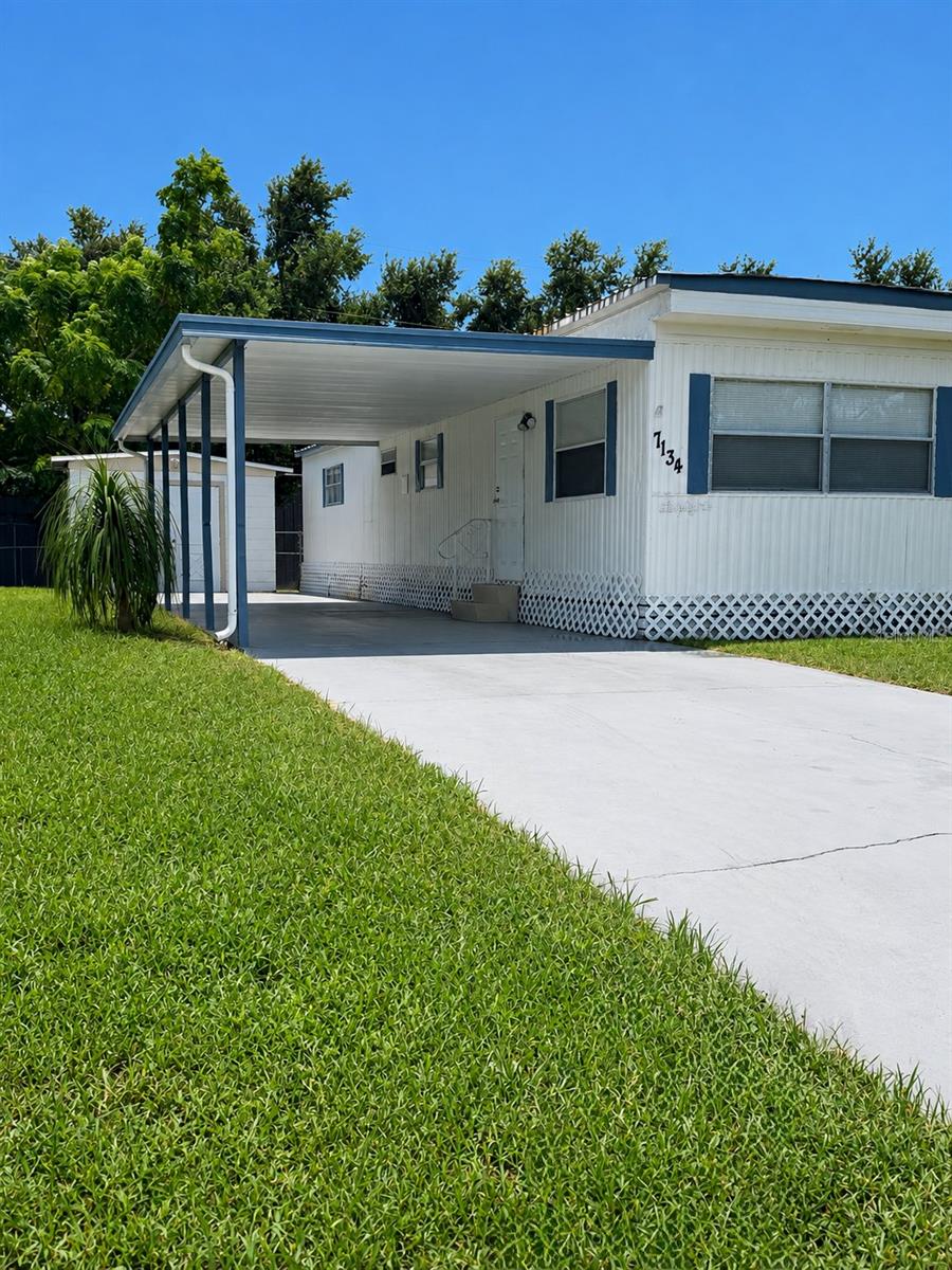 Photo 3 of Manufactured home for sale at 7134 Lofty Dr, Port Richey, FL 34668 | MLS# W7889047 | Listing updated on 2026-09-02