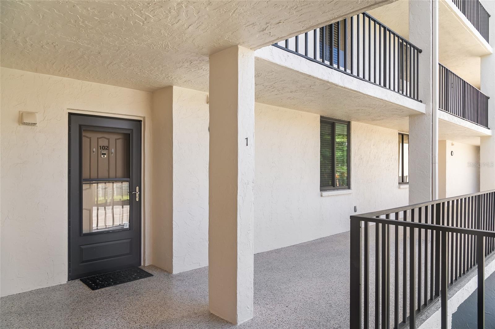 Listing Photo 3 - Condo for sale in building located at 6265 Midnight Pass Rd, Sarasota, FL 34242 - Unit #102