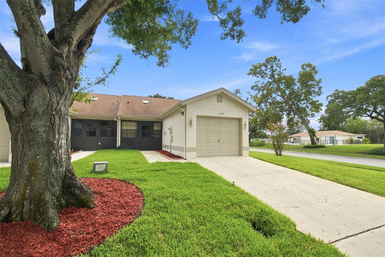 Photo 1 of Single family home for sale at 11712 Spring Tree Ln, Port Richey, FL 34668 | MLS# TB8544269 | Listing updated on 2026-09-02