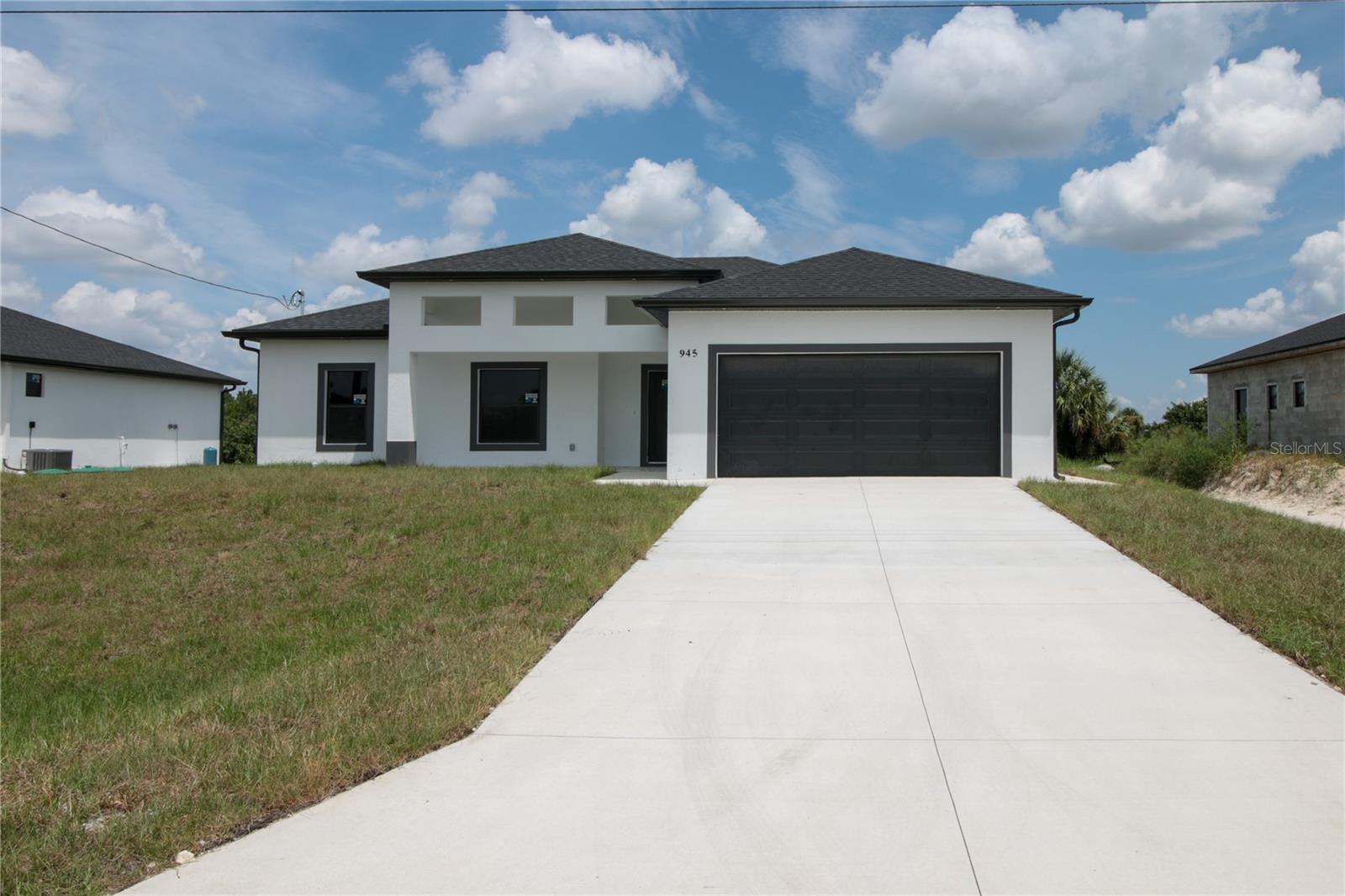 1st image of 945 Commodore St, Lehigh Acres, FL 33974 | MLS# O6438060