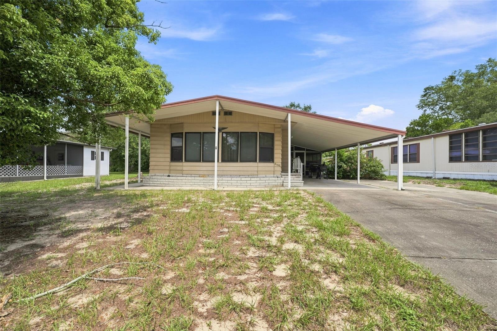 Photo 5 of Manufactured home for sale at 8150 Modena Ave, Brooksville, FL 34613 | MLS# W7889126 | Listing updated on 2026-09-04