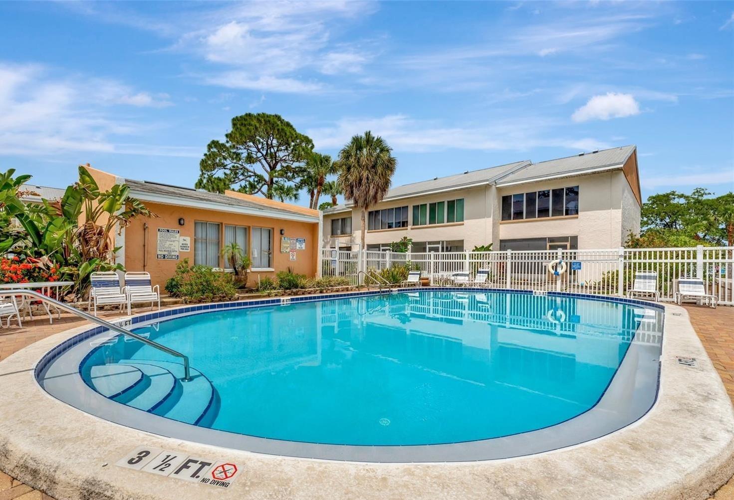 Listing Photo 2 - Condo for sale in building located at 621 99Th Ave N, St. Petersburg, FL 33702 - Unit #104