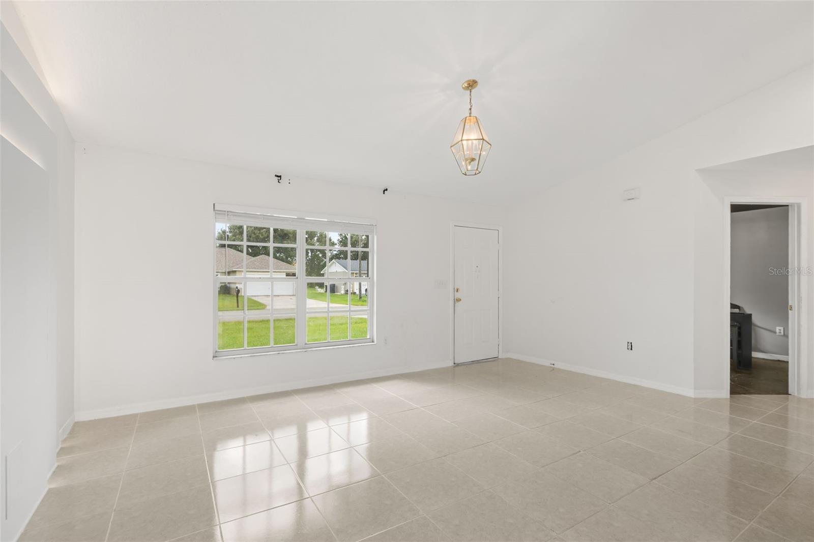 Photo 5 of Single family home for sale at 605 Tamarin Ln, Kissimmee, FL 34759 | MLS# O6438836 | Listing updated on 2026-09-03