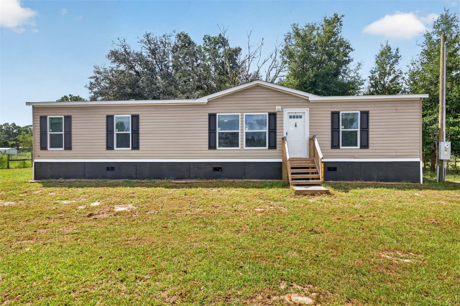 Photo 1 of Manufactured home for sale at 8330 Ne 113th Lane, Bronson, FL 32621 | MLS# GC543242 | Listing updated on 2026-09-04