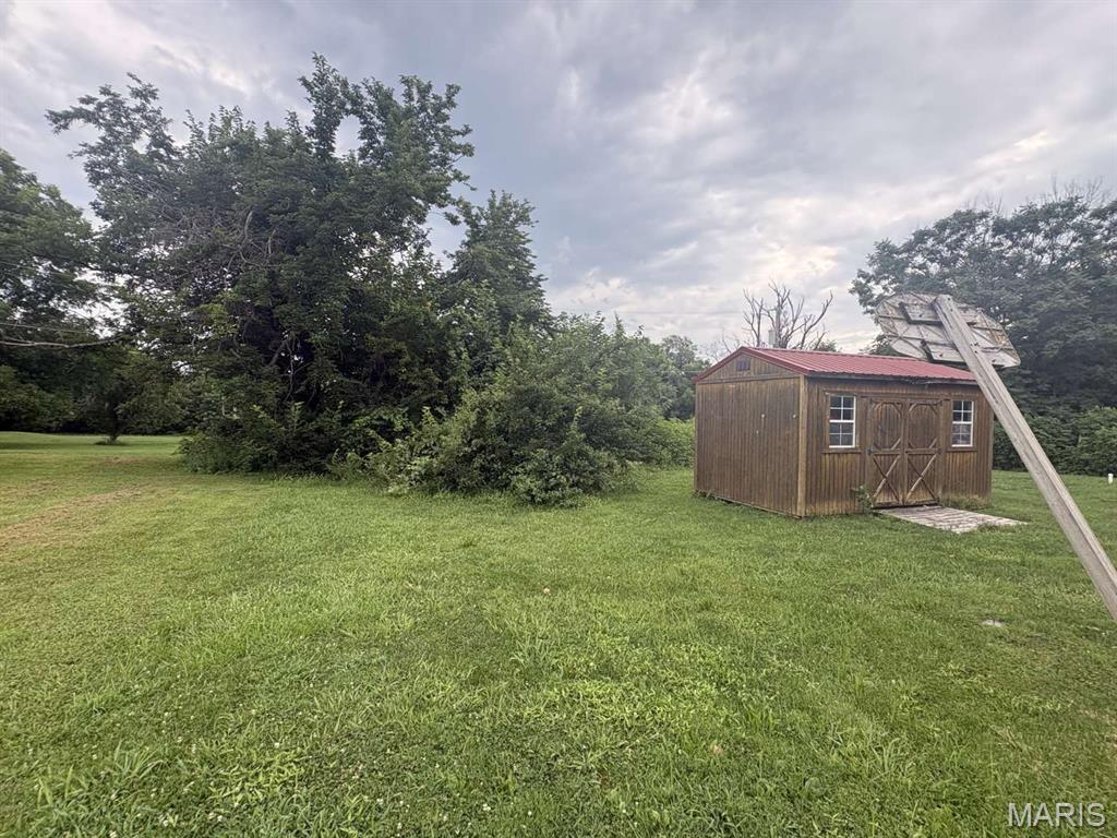 4th image of 213 E Johnson St, Sedalia, MO 65301 | MLS# MIS26047346