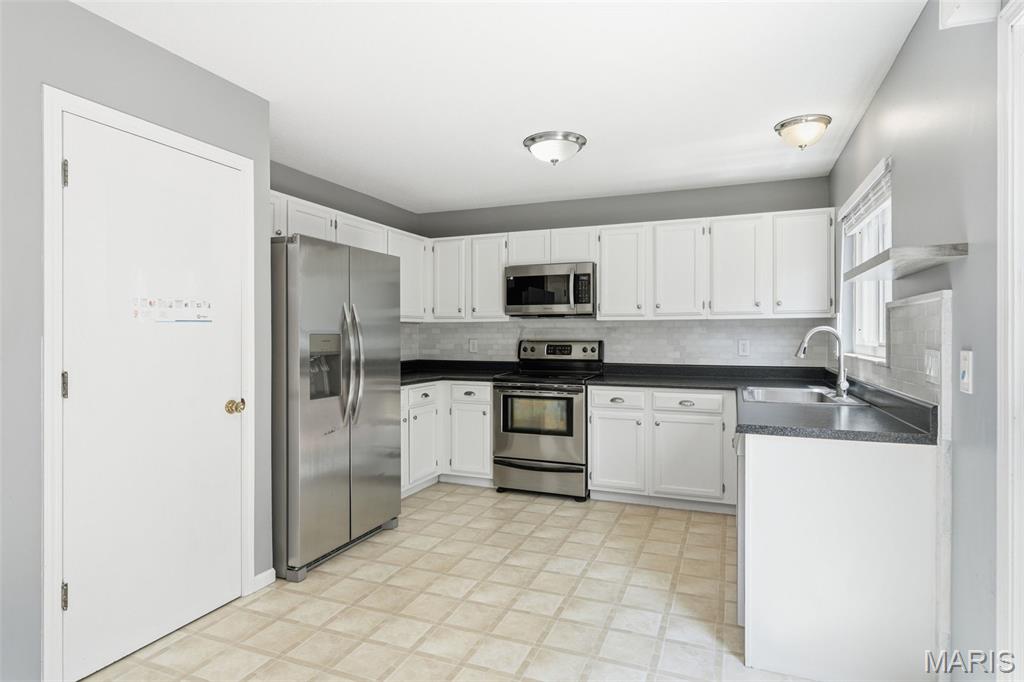 4th image of 816 Ginger Wood Ct, Twin Oaks, MO 63021 | MLS# MIS26050076
