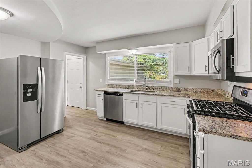 3rd image of 1405 Del Rey Dr, Florissant, MO 63031 | MLS# MIS26052419
