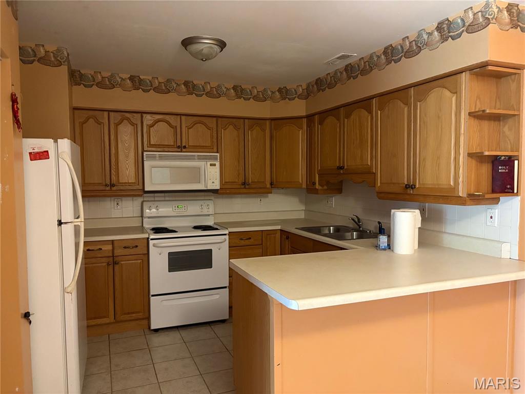 2nd image of 10011 Echoridge Ln #G, Mehlville, MO 63125 | MLS# MIS26054269