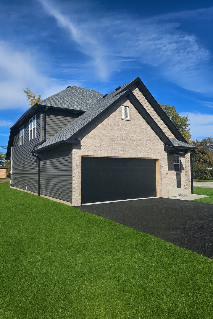 2nd image of 738 E 155th St, Phoenix, IL 60426 | MLS# 12671387