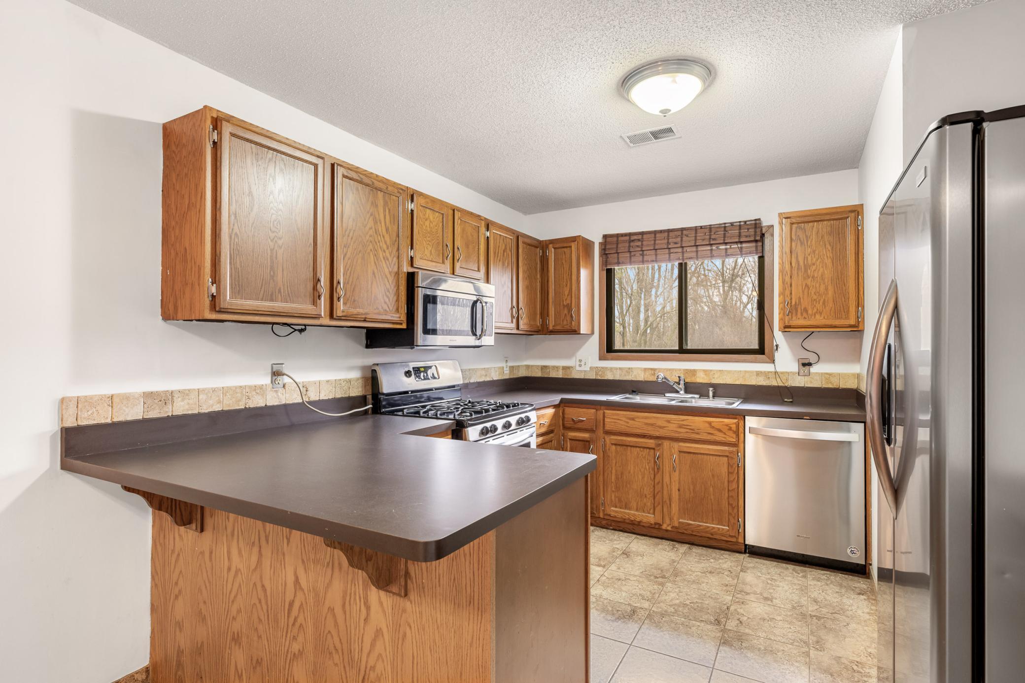 Homes for sale in Oakdale, MN | 1658 Helena Rd N, Oakdale, MN 55128 | MLS# 7019213