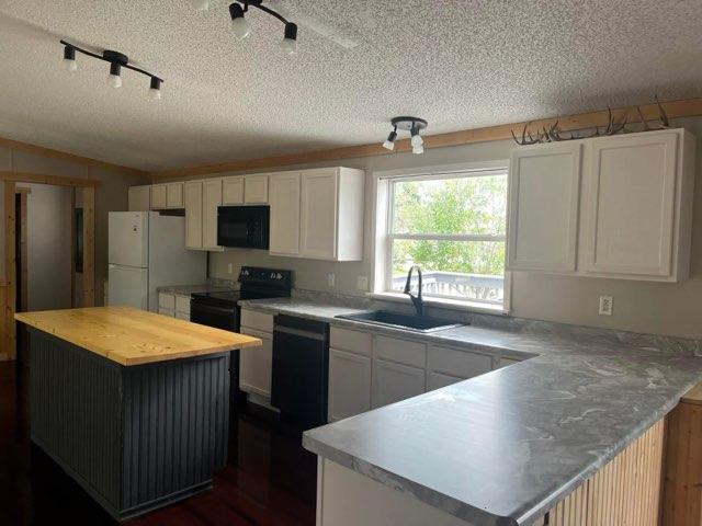 4th image of 207 Lakin Ave Sw, Kelliher, MN 56650 | MLS# 7116439