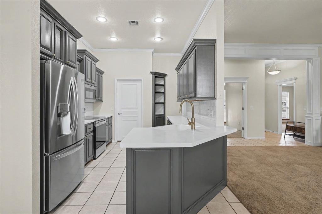 2nd image of 1125 S Oakey Dr, Mustang, OK 73064 | MLS# 1243871
