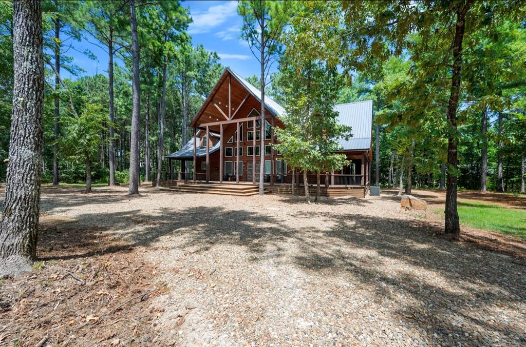 3rd image of 145 Hackberry Flats Trl, Broken Bow, OK 74728 | MLS# 1244666