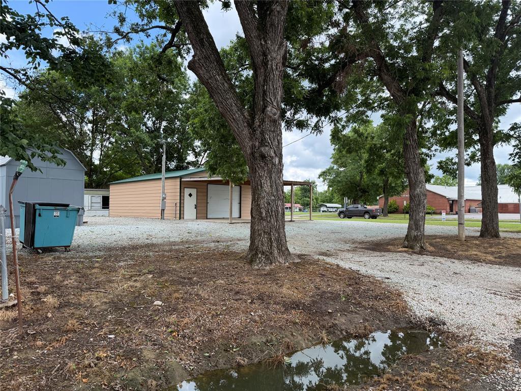 3rd image of 306 E Gentry Ave, Checotah, OK 74426 | MLS# 1245465