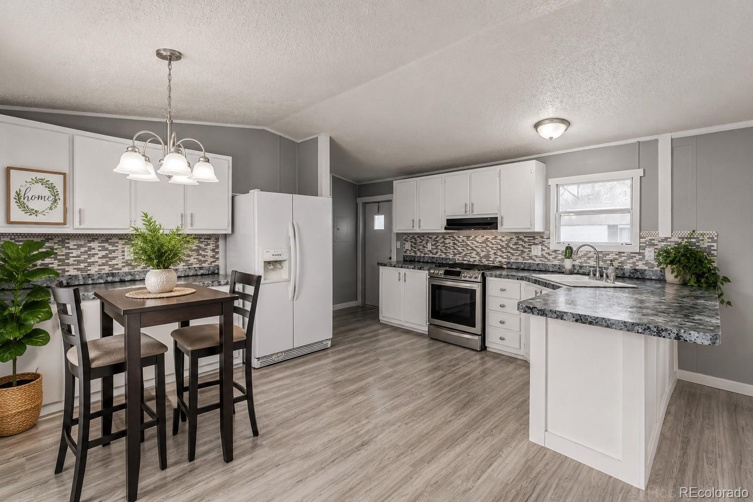2nd image of 5435 Riverdale Ave, Denver, CO 80229 | MLS# 2315960