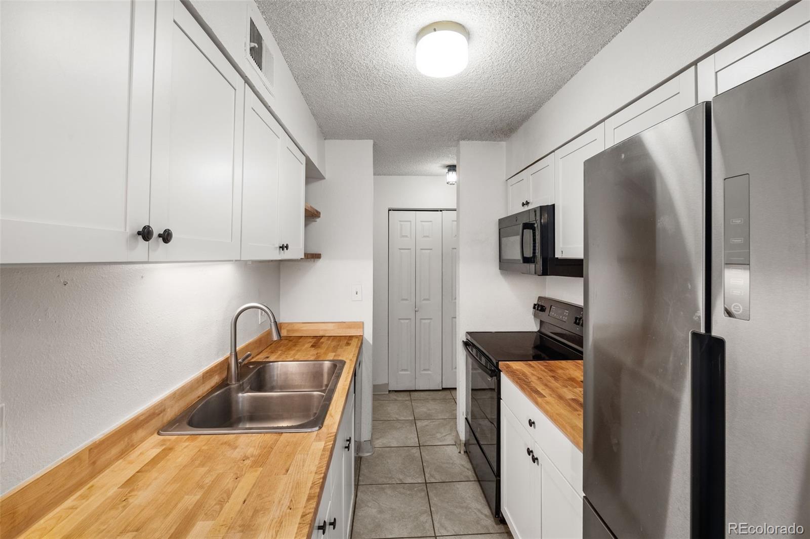 Listing Photo 5 - Condo for sale in building located at 140 E Highline Cir, Centennial, CO 80122 - Unit #108