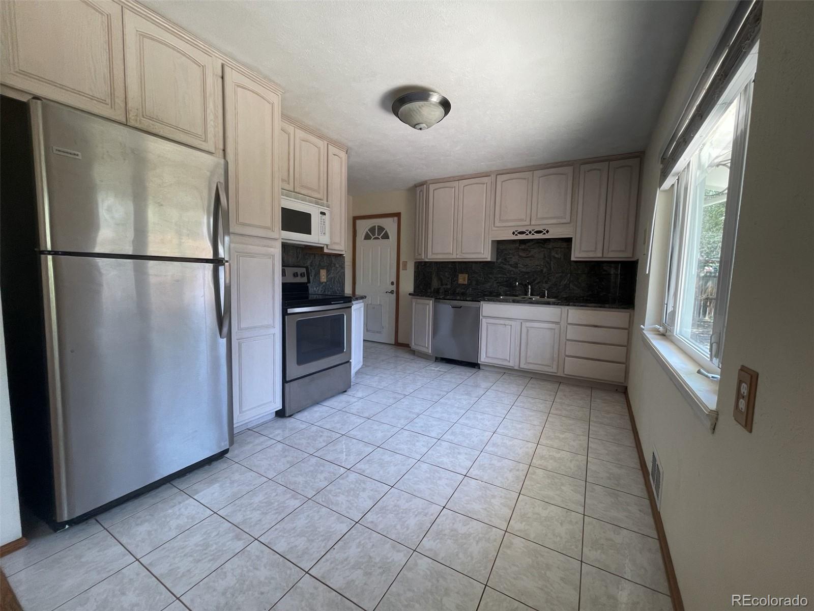 4th image of 3100 S Mabry Wy, Denver, CO 80236 | MLS# 6381900