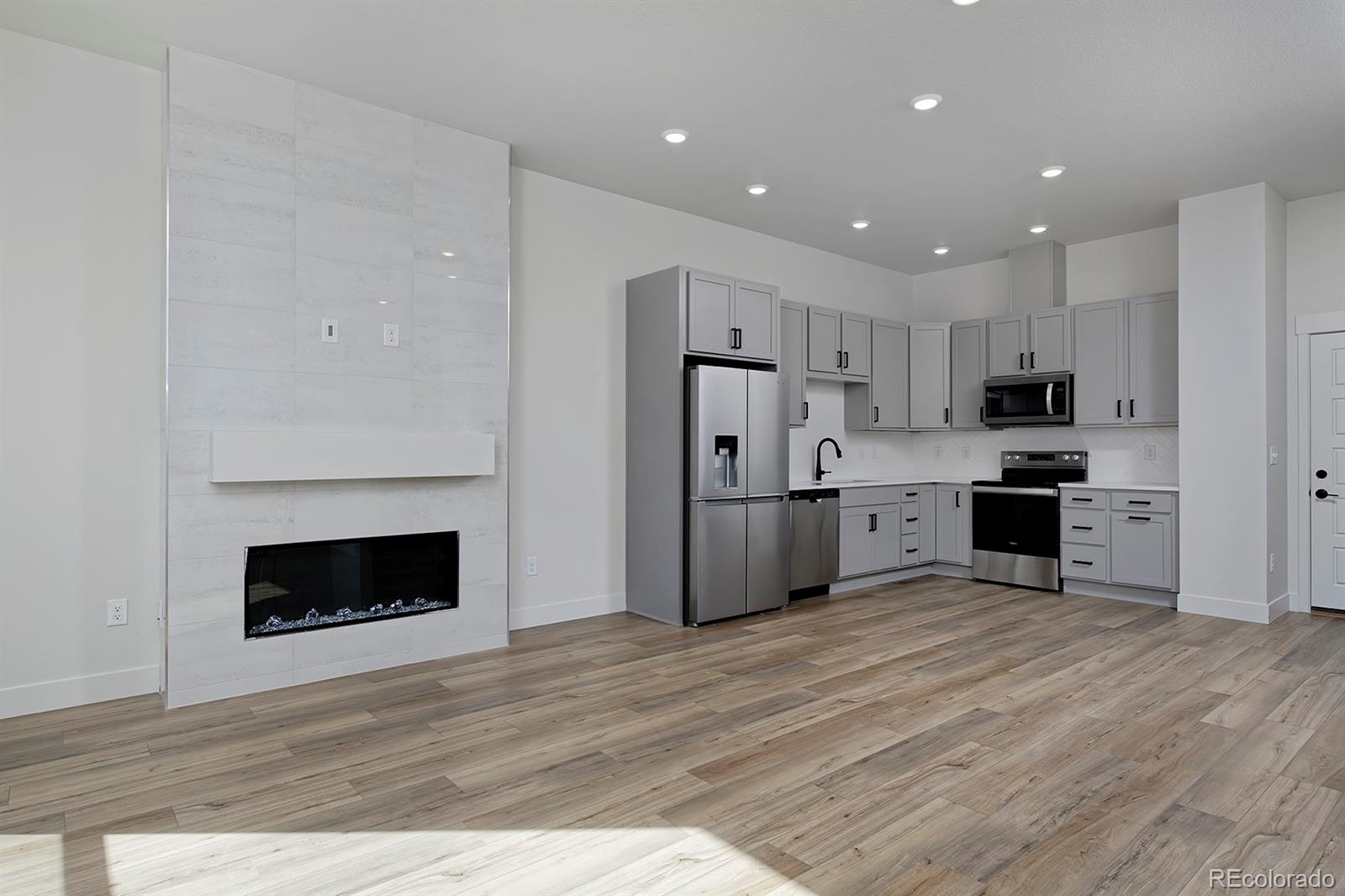 3rd image of 3132 W Bonfils Pl, Denver, CO 80236 | MLS# 7021890