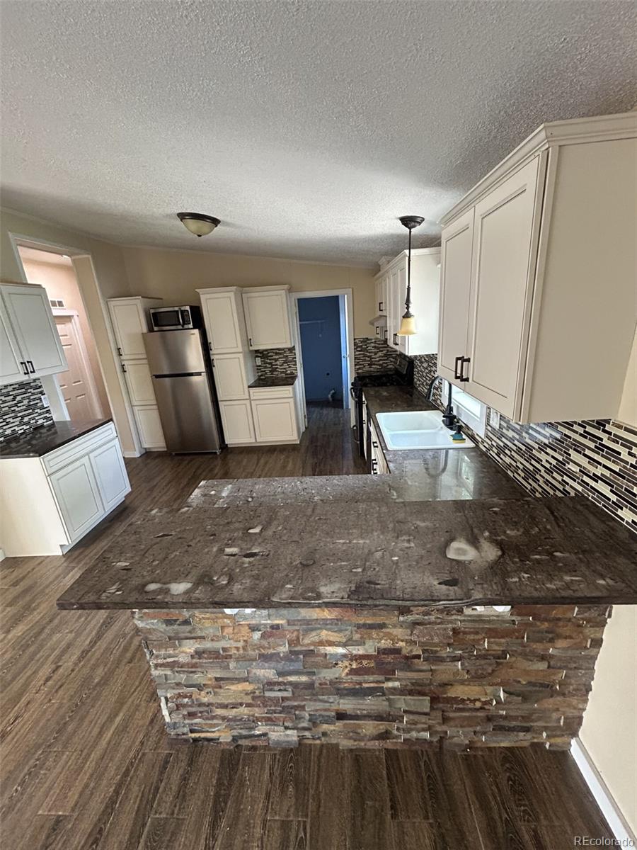 2nd image of 242 Faraday St, Monte Vista, CO 81144 | MLS# 9081913