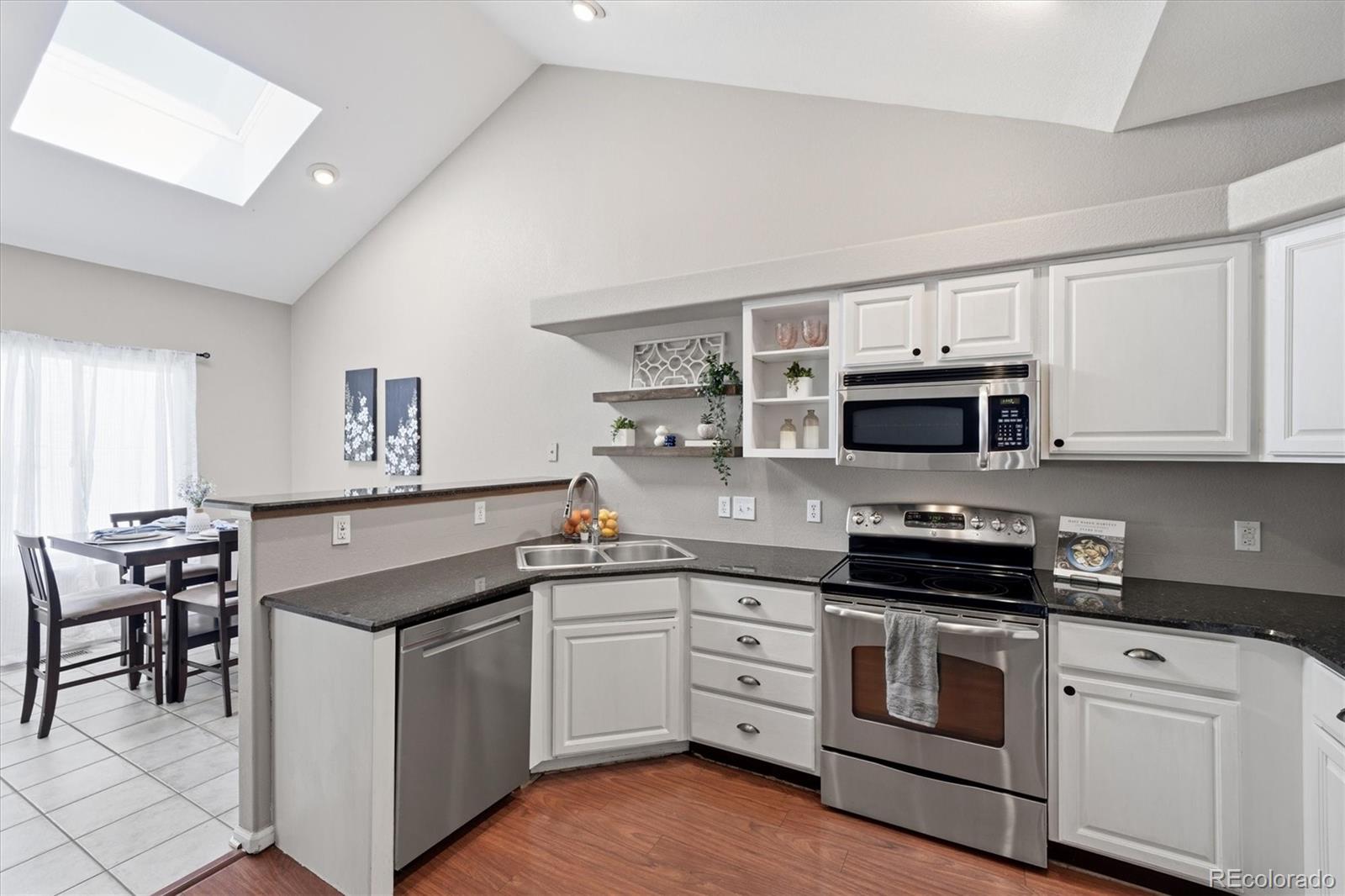 Photo 5 of Townhouse for sale at 8469 S Upham Way, Littleton, CO 80128 | MLS# 4474498 | Listing updated on 2026-09-02