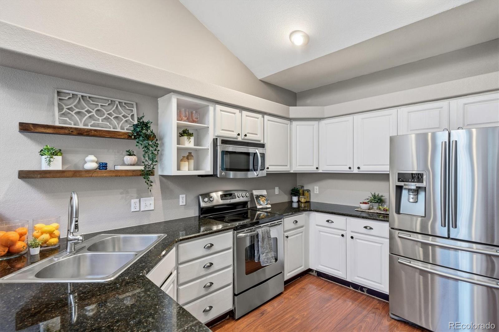 Photo 3 of Townhouse for sale at 8469 S Upham Way, Littleton, CO 80128 | MLS# 4474498 | Listing updated on 2026-09-02