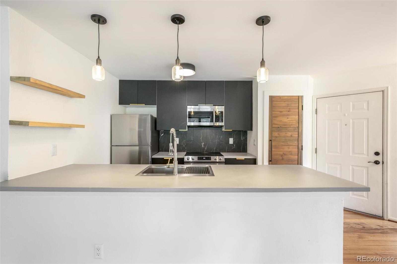 Photo 4 of Condo for sale at 3600 S Pierce St #5-103, Denver, CO 80235 | MLS# 5148784 | Listing updated on 2026-09-02