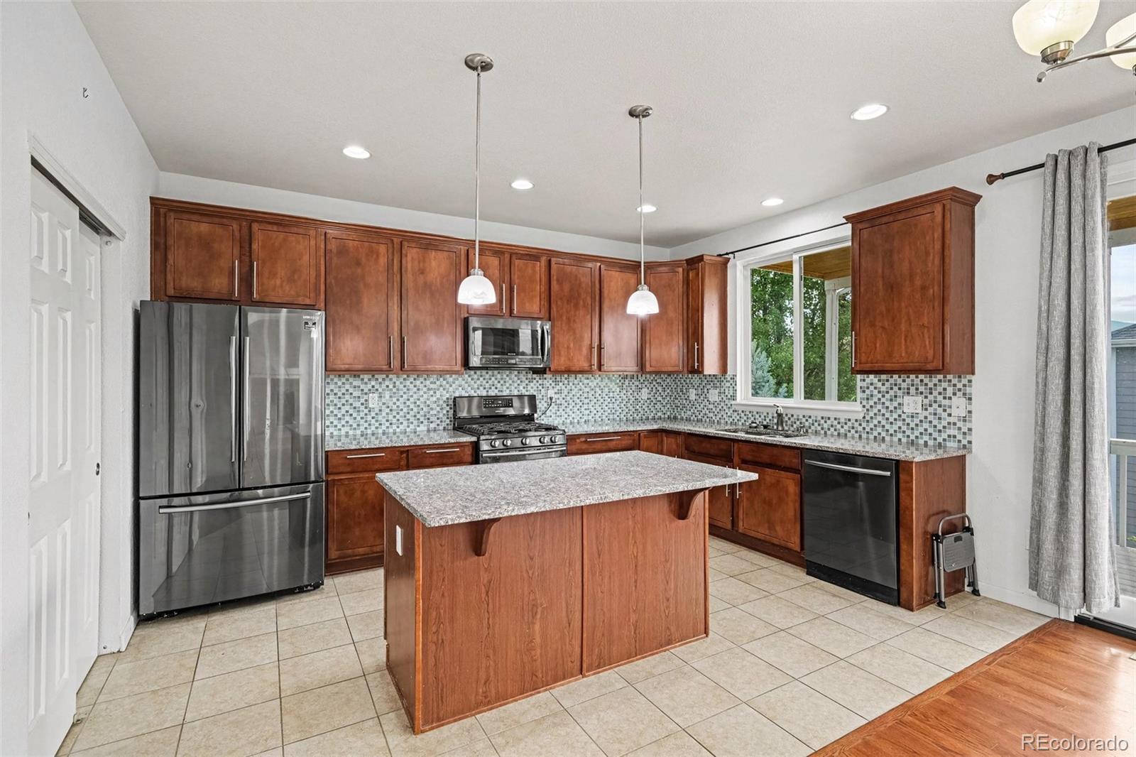 Photo 5 of Single family home for sale at 11240 W Tanforan Cir, Littleton, CO 80127 | MLS# 4332630 | Listing updated on 2026-09-02